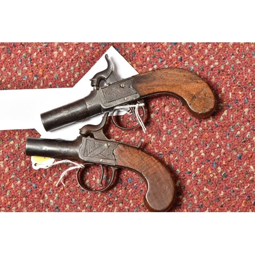 296 - TWO 19TH CENTURY FLINTLOCK POCKET PISTOLS, both with plain walnut grips, one marked Pritchard and fi... 