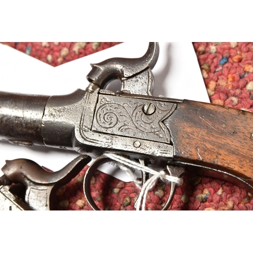 296 - TWO 19TH CENTURY FLINTLOCK POCKET PISTOLS, both with plain walnut grips, one marked Pritchard and fi... 