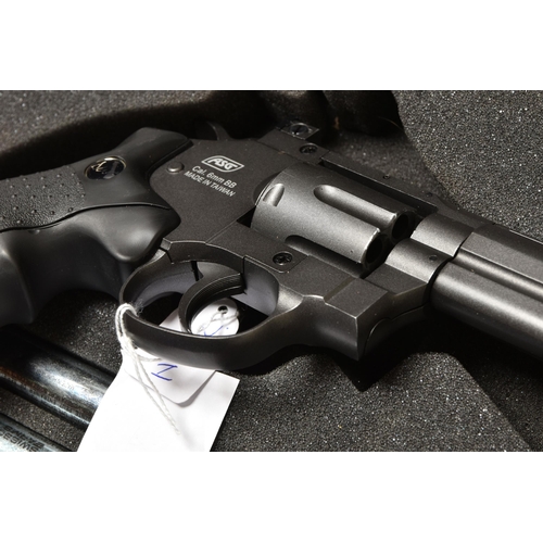 297 - A DAN WESSON 8'' CO2 POWERED 6MM AIRSOFT GUN, in a plastic carrying case, with pellet cannisters, co... 