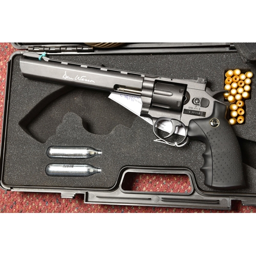 297 - A DAN WESSON 8'' CO2 POWERED 6MM AIRSOFT GUN, in a plastic carrying case, with pellet cannisters, co... 