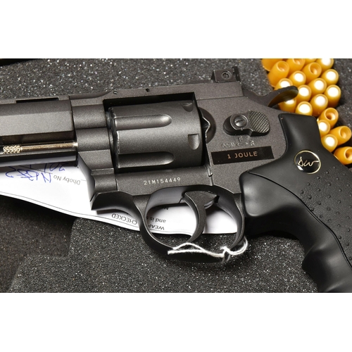 297 - A DAN WESSON 8'' CO2 POWERED 6MM AIRSOFT GUN, in a plastic carrying case, with pellet cannisters, co... 