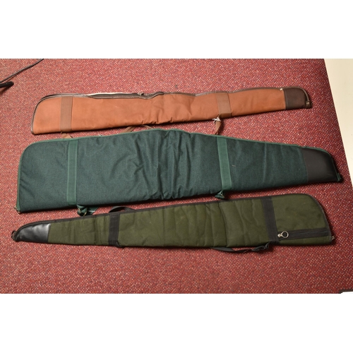 298 - A GUNLUGGA GREEN CANVAS AIR RIFLE CARRYING CASE, and two other air rifle carrying cases (3)