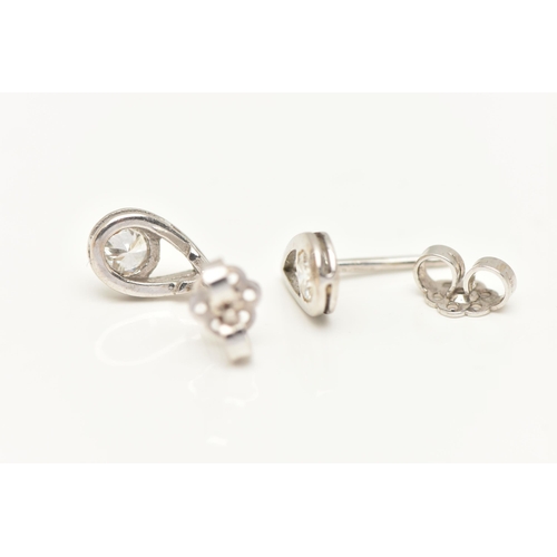 18 - A PAIR OF 18CT WHITE GOLD DIAMOND EARRINGS, each of a pear drop open work design set with a round br... 