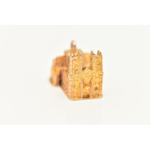 19 - A 9CT GOLD WESTMINSTER ABBEY CHARM, yellow gold charm in the form of Westminster Abbey, approximate ... 