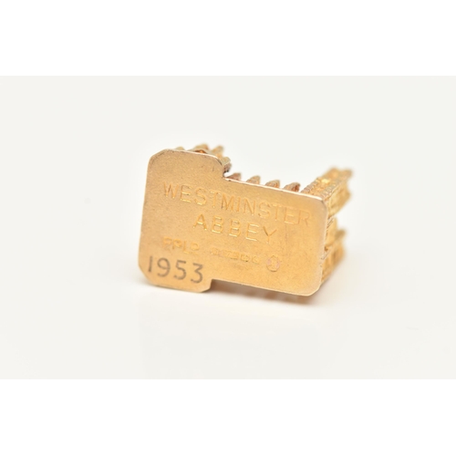 19 - A 9CT GOLD WESTMINSTER ABBEY CHARM, yellow gold charm in the form of Westminster Abbey, approximate ... 