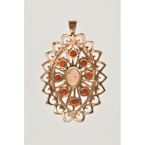 33 - A 9CT GOLD OPAL AND GARNET SET PENDANT, of a lozenge open work shape, set with a central oval cut op... 