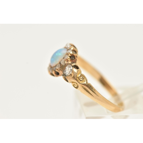 34 - A LATE VICTORIAN 18CT GOLD OPAL AND DIAMOND CLUSTER RING, of an oval form set with a central oval op... 