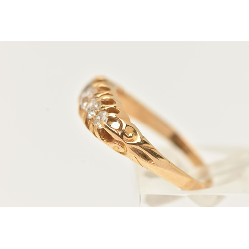 38 - AN 18CT GOLD DIAMOND FIVE STONE RING, set with five graduating old cut diamonds, each in a claw sett... 