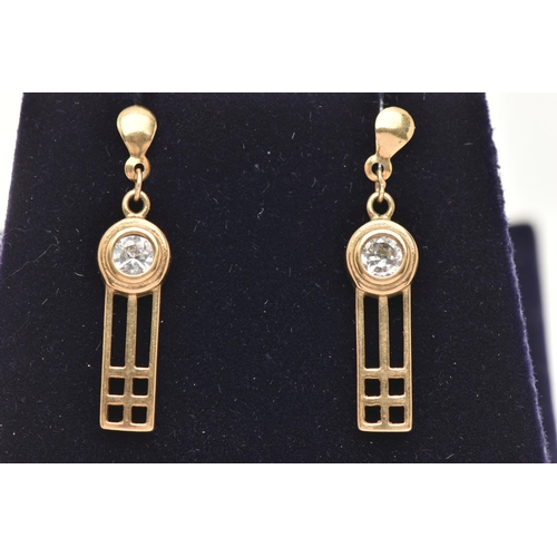 53 - A PAIR OF YELLOW METAL CUBIC ZIRCONIA SET DROP EARRINGS, each open work drop earring set with a circ... 