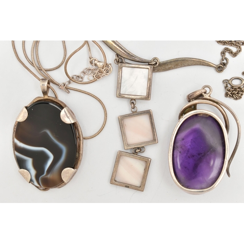 58 - THREE ITEMS OF JEWELLERY, to include a large oval amethyst cabochon set pendant, collet set in a whi... 