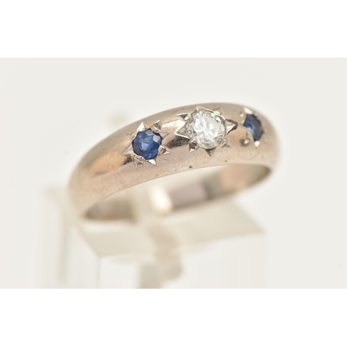 66 - AN 18CT GOLD GEM SET RING, a white gold tapered band ring, star set round brilliant cut diamond to t... 