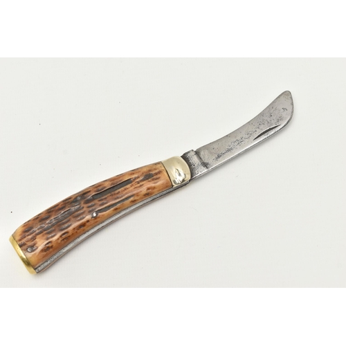 109 - A FLAT CAP PRUNNING KNIFE, fitted with an antler handle, blade signed but worn and unreadable, also ... 