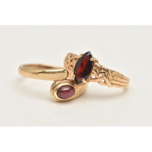 78 - TWO 9CT GOLD GEM SET RINGS, the first set with a marquise cut garnet four claw set to the Celtic pat... 