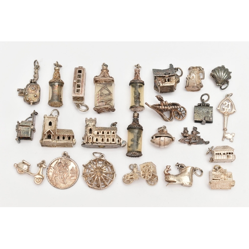 81 - ASSORTED WHITE METAL CHARMS, in various forms to include church, boots, houses, shell, tankard, St. ... 