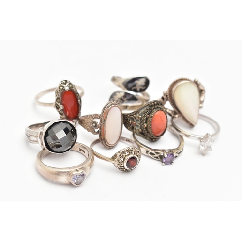 82 - AN ASSORTMENT OF TEN RINGS, to include one silver band ring set with a heart cut cubic zirconia, hal... 