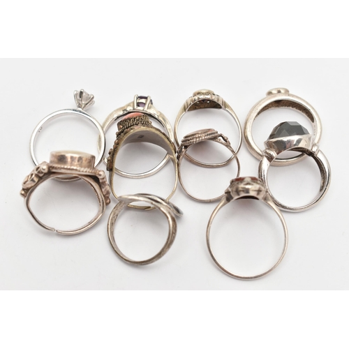 82 - AN ASSORTMENT OF TEN RINGS, to include one silver band ring set with a heart cut cubic zirconia, hal... 