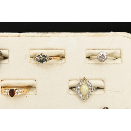 89 - AN ASSORTMENT OF ELEVEN RINGS, to include a white and yellow metal ring with Portuguese Porto hallma... 