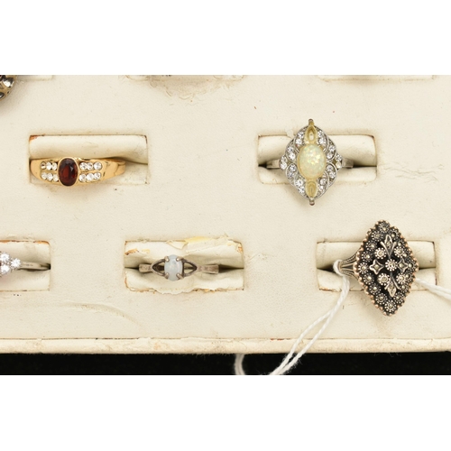 89 - AN ASSORTMENT OF ELEVEN RINGS, to include a white and yellow metal ring with Portuguese Porto hallma... 