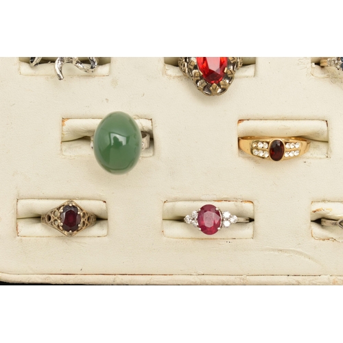 89 - AN ASSORTMENT OF ELEVEN RINGS, to include a white and yellow metal ring with Portuguese Porto hallma... 