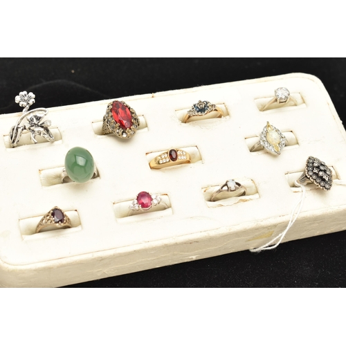 89 - AN ASSORTMENT OF ELEVEN RINGS, to include a white and yellow metal ring with Portuguese Porto hallma... 