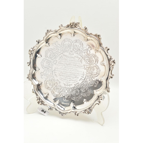 94 - A VICTORIAN SILVER PRESENTATION SALVER, circular form salver with scrolling detail to the rim, engra... 