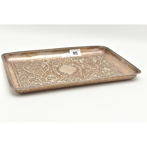 95 - AN EARLY 20TH CENTURY SILVER EMBOSSED TRAY, of a rectangular form with embossed design, vacant carto... 