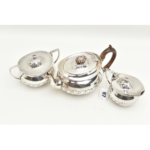 97 - A VICTORIAN THREE PIECE SILVER TEA SET, a tea pot, milk jug and lidded sugar pot, part lobed design ... 