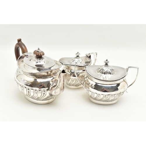 97 - A VICTORIAN THREE PIECE SILVER TEA SET, a tea pot, milk jug and lidded sugar pot, part lobed design ... 