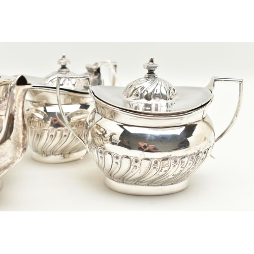 97 - A VICTORIAN THREE PIECE SILVER TEA SET, a tea pot, milk jug and lidded sugar pot, part lobed design ... 