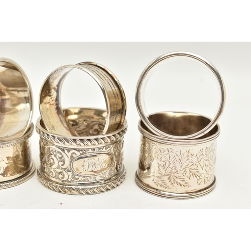 99 - AN ASSORTMENT OF SILVER NAPKIN RINGS, eight silver napkins all with varying designs, four hallmarked... 