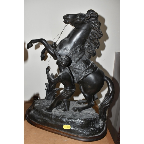 301 - A GROUP OF SPELTER FIGURES, to include a pair of marly horses, painted black, in mould Cousteau sign... 