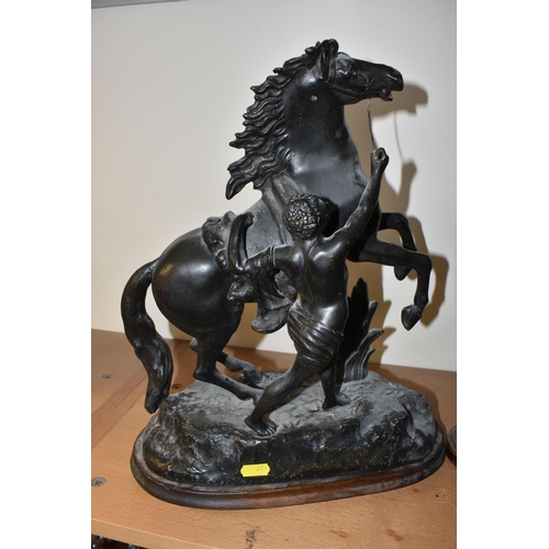 301 - A GROUP OF SPELTER FIGURES, to include a pair of marly horses, painted black, in mould Cousteau sign... 