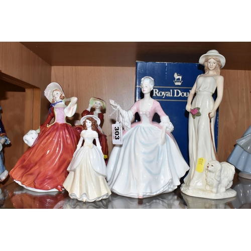 303 - A GROUP OF PORCELAIN FIGURINES to include three Royal Doulton figurines comprising a boxed 'Diana' H... 