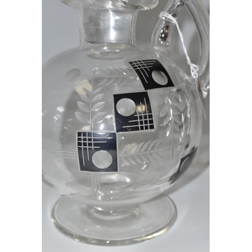 304 - A KARL PALDA CLARET JUG, Czech Art Deco, engraved with a geometric design that is hand enamelled in ... 