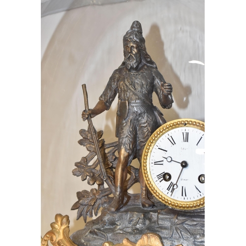 315 - A GLASS DOMED METAL MANTEL CLOCK comprising a gilded and bronzed metal figural mantel clock depictin... 