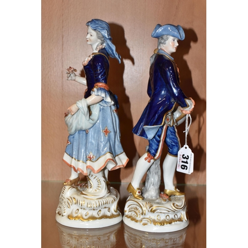 316 - A PAIR OF RUDOLSTADT VOLKSTEDT FIGURINES comprising a  female figurine carrying flowers in her dress... 