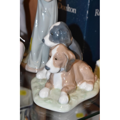 321 - A GROUP OF FIVE LLADRO AND NAO FIGURINES to include two Lladro figures comprising 'My Loyal Friend' ... 