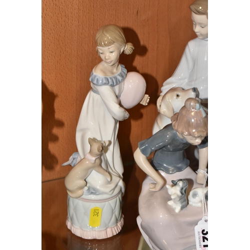 321 - A GROUP OF FIVE LLADRO AND NAO FIGURINES to include two Lladro figures comprising 'My Loyal Friend' ... 