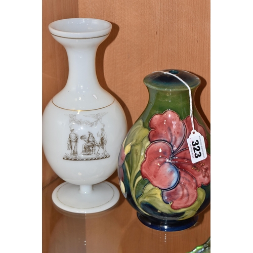 323 - A MOORCROFT POTTERY 'HIBISCUS' PATTERN LAMP BASE, together with a transfer printed milk glass vase, ... 