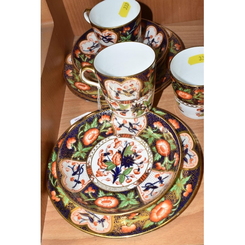 333 - A SET OF SIX 'IMARI PATTERNED' DAVENPORT TEA/COFFEE TRIOS to include six cups (four with red Davenpo... 