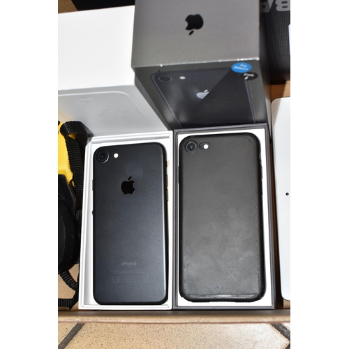 344 - A BOX OF ELECTRONIC ITEMS, to include two boxed iPhones: a grey 16GB iPhone 6, model A1778, and a bl... 