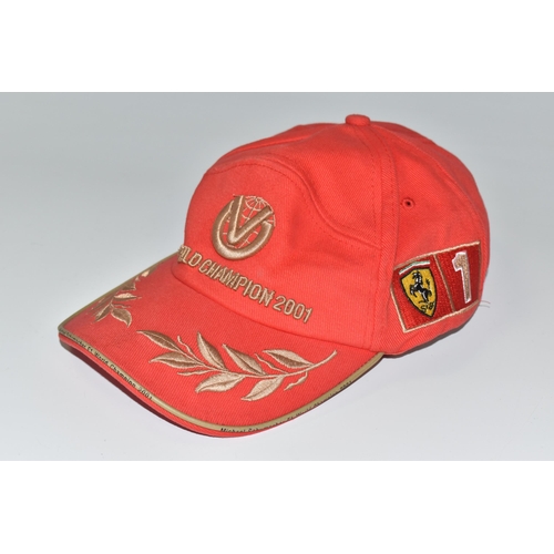 364 - A MICHAEL SCHUMACHER COLLECTION F1 WORLD CHAMPION 2001 BASEBALL, red cap with adjustable band in red... 