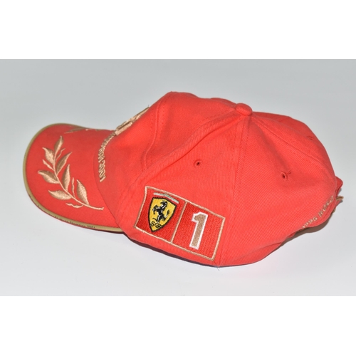 364 - A MICHAEL SCHUMACHER COLLECTION F1 WORLD CHAMPION 2001 BASEBALL, red cap with adjustable band in red... 