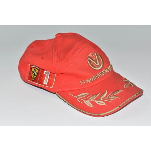 364 - A MICHAEL SCHUMACHER COLLECTION F1 WORLD CHAMPION 2001 BASEBALL, red cap with adjustable band in red... 