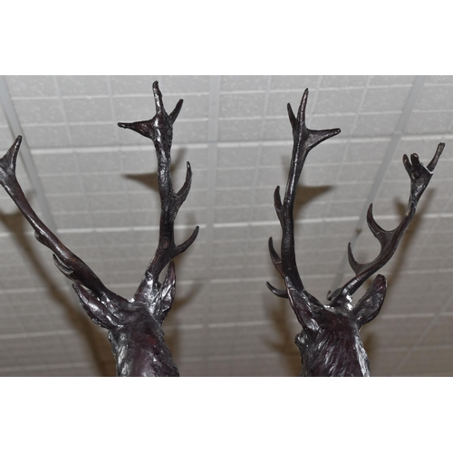 393 - TWO LARGE CAST BRONZE STAG FIGURES, after Jules Moigniez (French 1835 - 1894), pair of hollow cast b... 