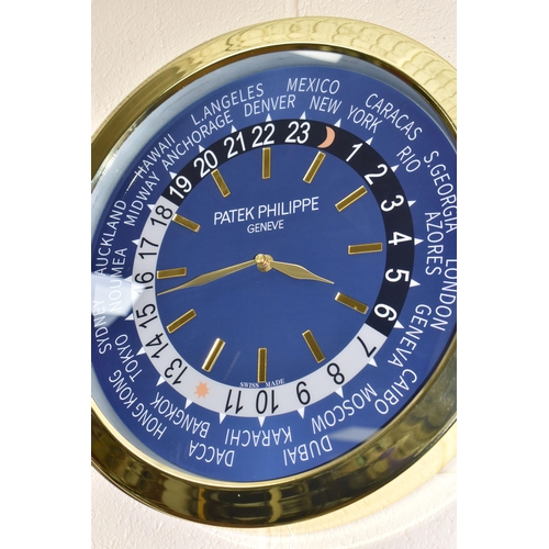 404 - A 'DISPLAY CLOCK' printed 'Patek Philippe', with a blue printed background and Arabic numeral twenty... 