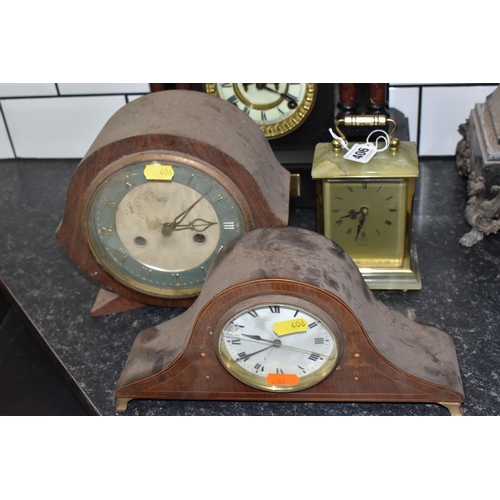 406 - A GROUP OF FOUR VINTAGE CLOCKS to include a black 'Ansonia' slate clock with a brass dedication plaq... 