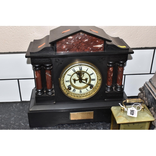 406 - A GROUP OF FOUR VINTAGE CLOCKS to include a black 'Ansonia' slate clock with a brass dedication plaq... 