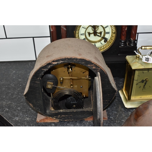 406 - A GROUP OF FOUR VINTAGE CLOCKS to include a black 'Ansonia' slate clock with a brass dedication plaq... 