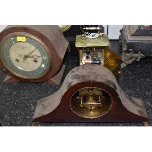 406 - A GROUP OF FOUR VINTAGE CLOCKS to include a black 'Ansonia' slate clock with a brass dedication plaq... 